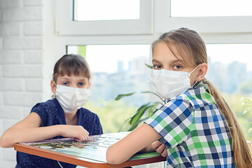 Image showing Sick quarantined children play a board games