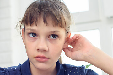 Image showing Close-up portrait of a girl with pronounced negative emotions