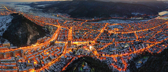 Image showing Aerial view of city lights in winter evening.