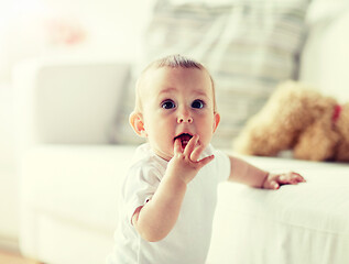 Image showing happy little baby boy or girl at home