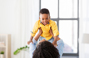 Image showing happy african american mother with baby at home