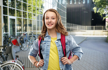 Image showing happy smiling teenage student girl with school bag