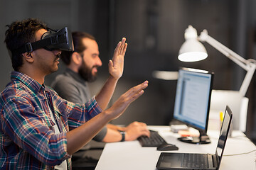 Image showing creative man in virtual reality headset at office