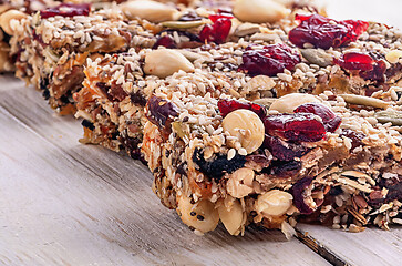 Image showing Closeup cereal granola bar with nuts