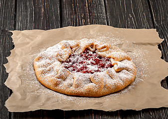 Image showing Galetta open gooseberries pie on paper