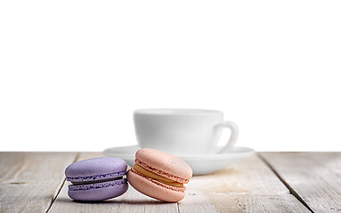 Image showing Two macaroons with a cup coffee