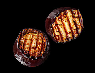 Image showing Two pieces of grilled eggplant rotate