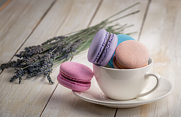 Image showing Macaroons in white cup with lavender