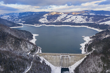 Image showing Energy dam and road, aerial winter scene