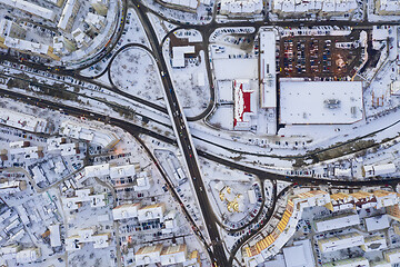 Image showing City road junctions on the bridge, above winter scene