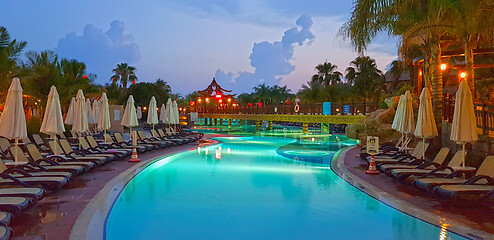 Image showing Empty poolside aflter sunset