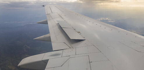 Image showing Plane wing before sunset