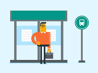 Image showing Caucasian man waiting for a bus at the bus stop.