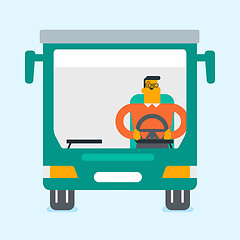 Image showing Caucasian bus driver sitting at steering wheel.