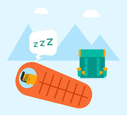 Image showing Man sleeping in a sleeping bag in the mountains.