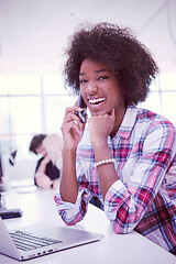 Image showing African American informal business woman working in the office