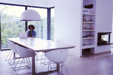 Image showing African American woman in the living room