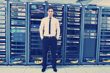 Image showing young it engineer in datacenter server room