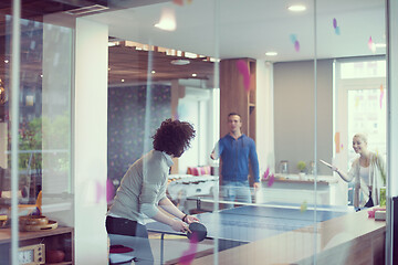 Image showing startup business team playing ping pong tennis