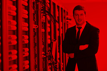 Image showing young engeneer in datacenter server room