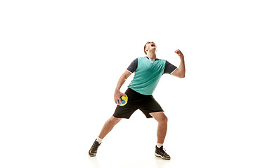 Image showing The one caucasian young man as handball player at studio on white background