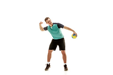 Image showing The one caucasian young man as handball player at studio on white background