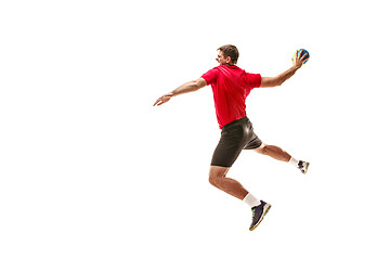 Image showing The one caucasian young man as handball player at studio on white background