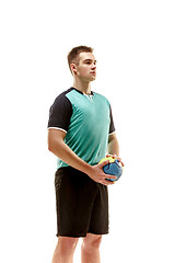 Image showing The one caucasian young man as handball player at studio on white background