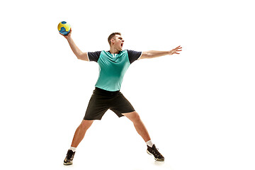 Image showing The one caucasian young man as handball player at studio on white background