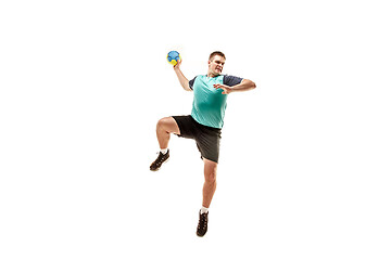 Image showing The one caucasian young man as handball player at studio on white background
