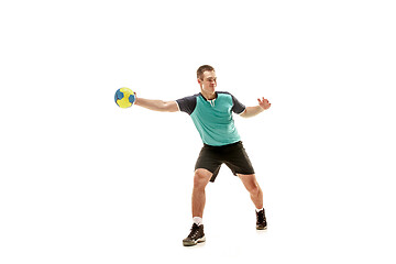 Image showing The one caucasian young man as handball player at studio on white background