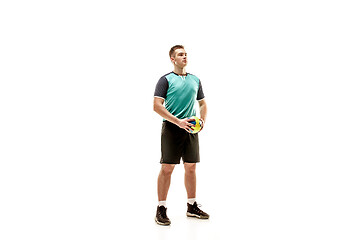 Image showing The one caucasian young man as handball player at studio on white background