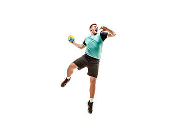 Image showing The one caucasian young man as handball player at studio on white background