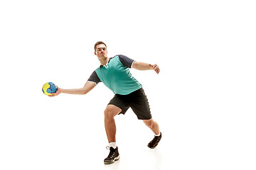 Image showing The one caucasian young man as handball player at studio on white background