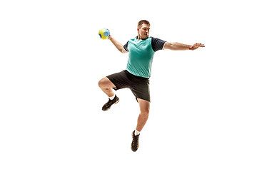 Image showing The one caucasian young man as handball player at studio on white background