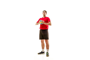 Image showing The one caucasian young man as handball player at studio on white background