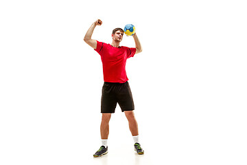 Image showing The one caucasian young man as handball player at studio on white background