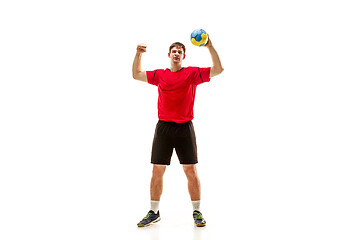 Image showing The one caucasian young man as handball player at studio on white background