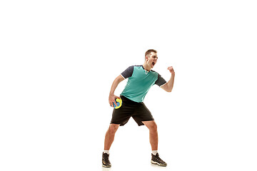 Image showing The one caucasian young man as handball player at studio on white background