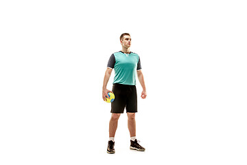 Image showing The one caucasian young man as handball player at studio on white background