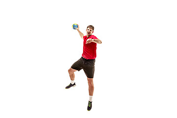 Image showing The one caucasian young man as handball player at studio on white background