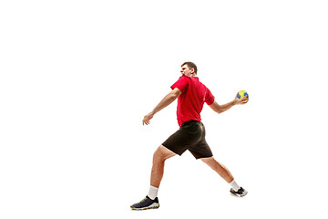 Image showing The one caucasian young man as handball player at studio on white background