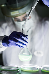 Image showing Scientist working in corona virus vaccine development laboratory research facility.