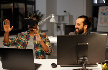 Image showing creative man in virtual reality headset at office