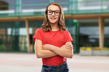 Image showing smiling student girl in glasses and red t-shirt