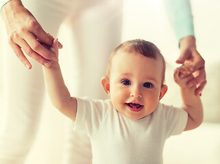 Image showing happy baby learning to walk with mother help