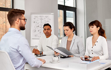 Image showing recruiters having job interview with male employee