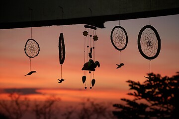 Image showing Decoration hanging on a terrace at dusk