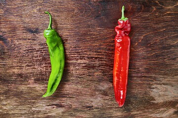 Image showing Two peppers on a table