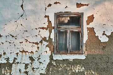 Image showing Abandoned house collapsing adobe wall and window